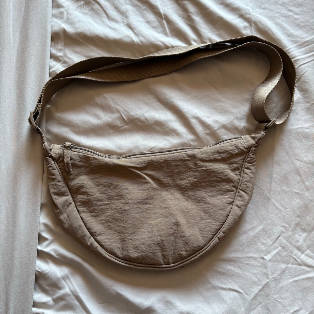 Uniqlo Round Beige Crossbody Bag-gently used